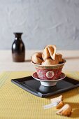 A bowl of fortune cookies