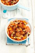 Minestrone with meatballs and farfalle