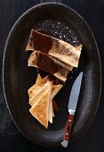 Marrowbones with red wine gravy and toast triangles