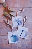 Photos of apples for hanging on a Christmas tree