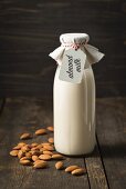 Almond milk in a glass bottle with a label