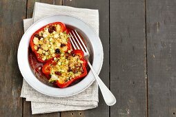 Pepper stuffed with couscous, raisins, dried tomatoes and feta cheese