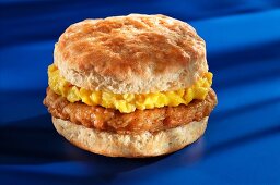 Pork and scrambled eggs on an American biscuit