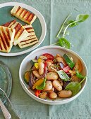 Giant bean salad with vegetables and grilled halloumi cheese