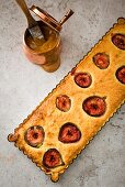 Fig and almond cake with chocolate and caramel sauce