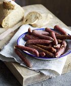 An arrangement of various raw sausages