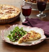 Quiche Lorraine with a mixed leaf salad and red wine