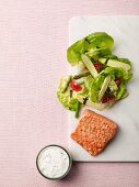 Salmon with lettuce, asparagus, courgette and ranch dressing