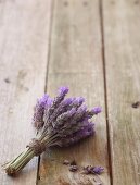 A bunch of lavender on a wooden surface