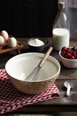 Baking ingredients for cherry clafoutis