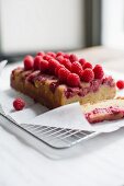 Lemon cake with raspberries, sliced