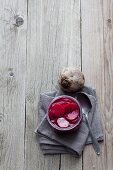 Pickled beetroot in a preserving jar (seen from above)