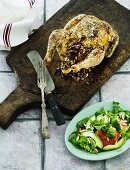 Stuffed roast chicken with a blood orange and avocado salad