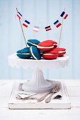 Red and blue whoopie pies filled with cream cheese frosting