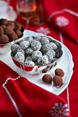 Truffle pralines with coconut and cocoa powder for Christmas