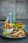 Spicy chicken with a corn salad