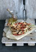 Grilled chicken breast in a spicy salad marinade