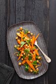 Oriental chickpea salad with braised baby carrots and fresh coriander
