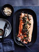 Salmon trout with almond sauce, rosemary and capers