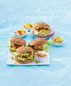 Hamburgers with spring onions, peppers and cashew nuts