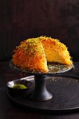 Spiced quark cake covered with kataifi pastry