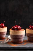 Iced chocolate and peppers soufflés with cherries