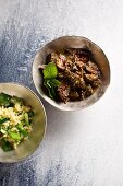 Game ragout with damsons and green couscous (Syria)