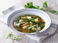 Miso soup with fresh garden herbs