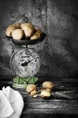 Potatoes on an old pair of kitchen scales