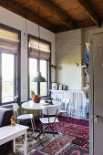 Dining area and kitchen in one-room apartment