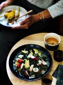 Seaweed salad with radish and pear