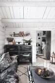 View from living room into bedroom in log cabin