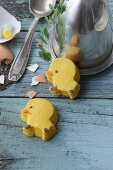 Chick biscuits on a rustic wooden surface