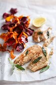 Grilled angelfish fillets with carrot and beetroot chips