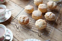 Scones on a wire rack served with afternoon tea