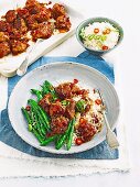 Crispy pork neck with chilli jam and green beans