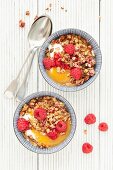 Peach melba muesli with raspberries