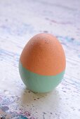 Easter egg half painted mint green