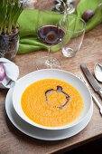Pumpkin soup with pumpkin oil for an Easter lunch