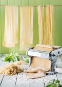 Fresh homemade pasta and pasta machine