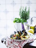Conchiglie with mussels and tomatoes