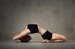 A woman practising yoga