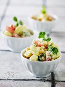 Potato salad with chickpeas, tomatoes and parsley