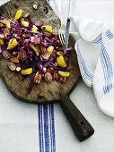 Winter red cabbage salad with grapes, oranges and nuts