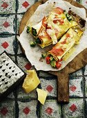 Yufka pastry rolls filled with vegetables and ham