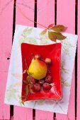 Fruit bowl on fabric printed using leaves and flowers