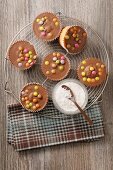 Cupcakes with chocolate glaze and chocolate beans