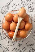 Chickens eggs in a glass bowl