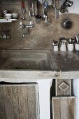 Masonry kitchen counter with rustic wooden doors