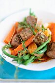 Lamb with beans and carrots